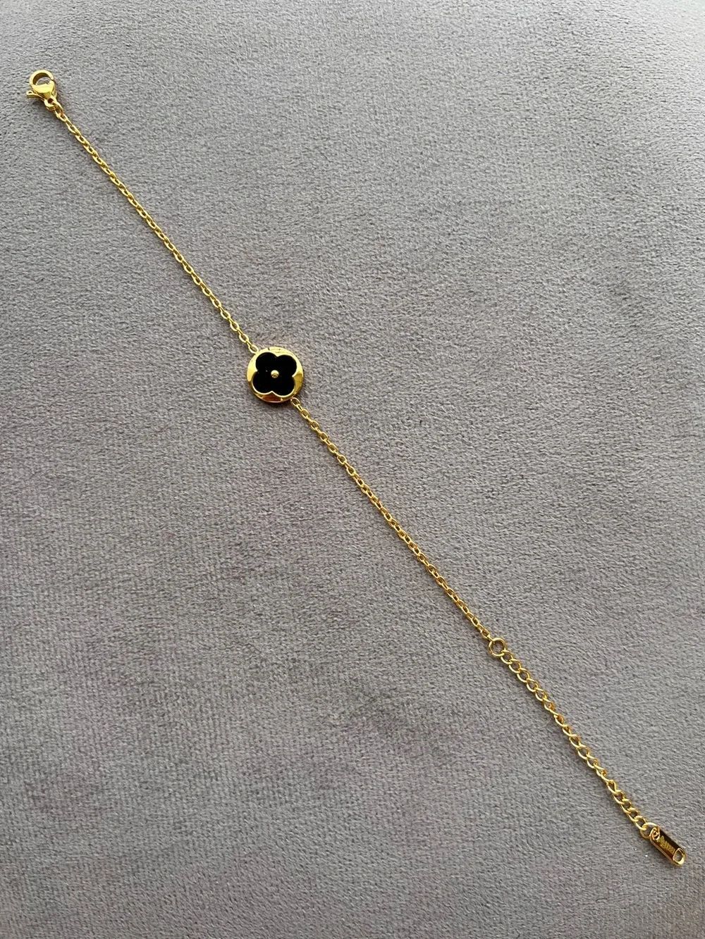 Gold Stainless Steel Bracelet with Black Flower Clover Charm